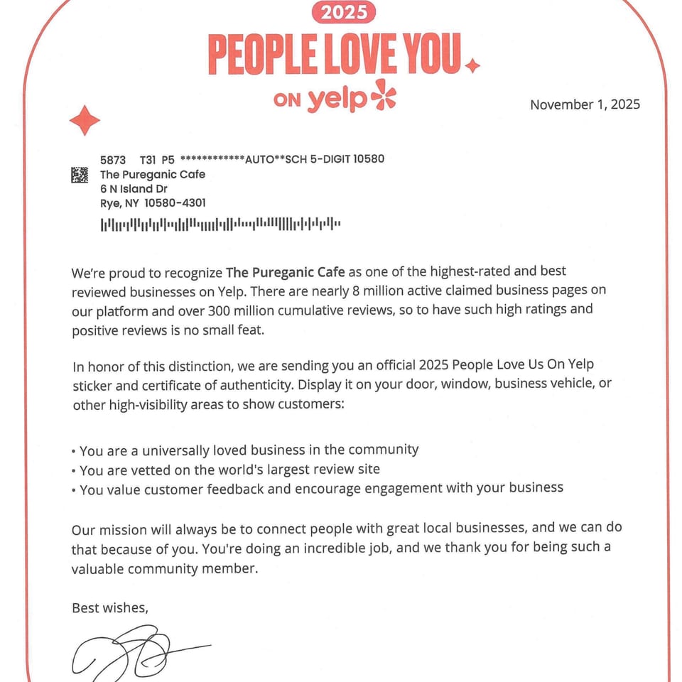 A Yelp letter congratulating The Pureganic Cafe for being a highly-rated business.